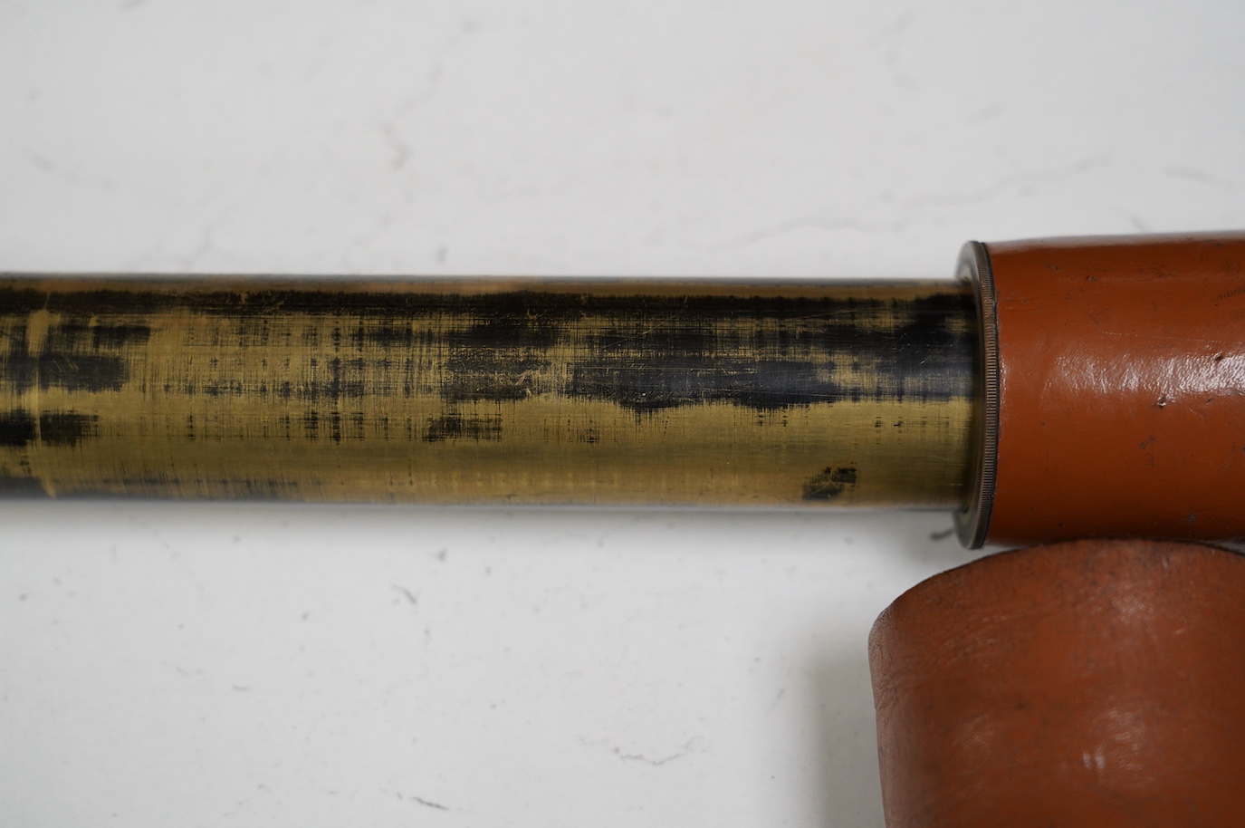 A brass three draw military telescope, marked “ABL 1950 Tel. Sgn. Mk VI. V6-OS 717 GA No 049”. Condition - fair to good, a little worn, good optics